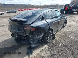 2023 Tesla Model X with VIN 7SAXCDE52PF425834, listed as a IAAI auction lot 41996298 with Not Provided miles and . Bid and sale history available at DreamBid. Image 4.