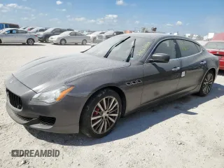 2016 Maserati Quattroporte S Q4 z VIN ZAM56RRA2G1188539, wystawiony jako Copart lot #74623484 z przebiegiem Nie podano mil oraz Szkody całkowita. Historia ofert i sprzedaży dostępna na DreamBid. Obrazek 1.