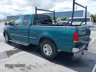 1998 Ford F-150 with VIN 1FTZX1760WKA90900, listed as a IAAI auction lot 42239510 with 198,405 mi miles and . Bid and sale history available at DreamBid. Image 3.