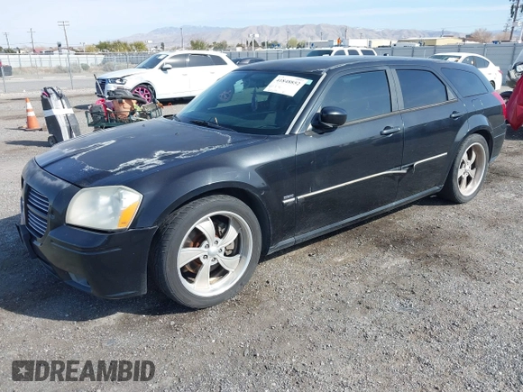 2005 Dodge Magnum RT with VIN 2D4GV58225H613701, listed as a IAAI auction lot 41848852 with 200,633 mi miles. Bid and sale history available at carsss.com. Image 2.