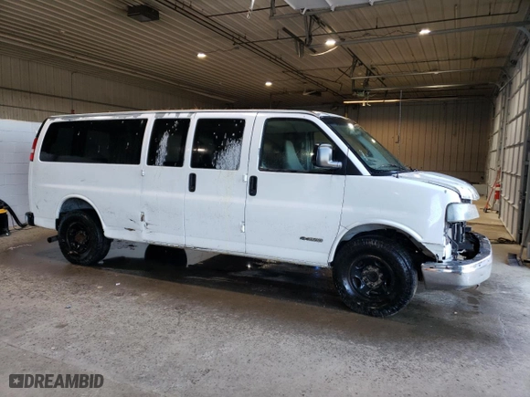 2004 Chevrolet Express Passenger with VIN 1GAHG39U341239136, listed as a Copart auction lot 74370344 with 217,839 mi miles and Salvage Title. Bid and sale history available at carsss.com. Image 4.