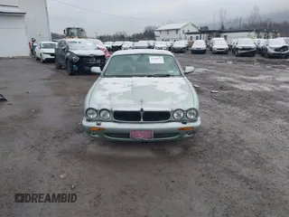 1998 Jaguar XJ with VIN SAJHN1242WC819689, listed as a IAAI auction lot 41148530 with 60,143 mi miles and . Bid and sale history available at DreamBid. Image 12.