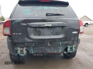 2014 Jeep Compass Latitude with VIN 1C4NJDEB2ED698213, listed as a IAAI auction lot 41997204 with 97,893 mi miles. Bid and sale history available at carsss.com. Image 6.