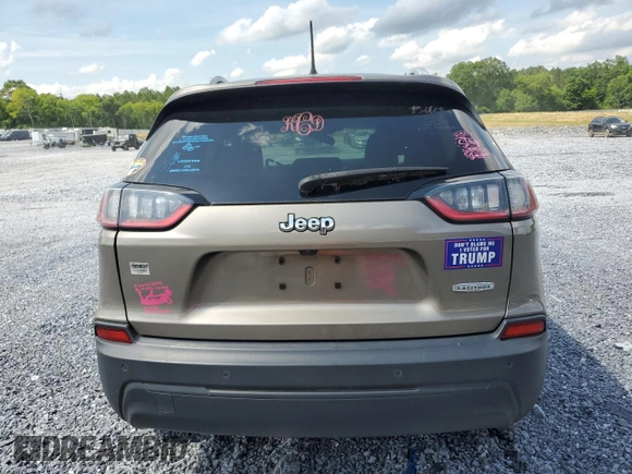 2020 Jeep Cherokee Latitude with VIN 1C4PJLCBXLD556789, listed as a Copart auction lot 58582565 with 66,865 mi miles and Salvage title. Bid and sale history available at DreamBid. Image 6.