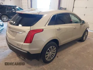 2017 Cadillac XT5 Luxury AWD z VIN 1GYKNDRS1HZ160606, wystawiony jako IAAI lot #41990425 z przebiegiem 130 822 mil mil oraz . Historia ofert i sprzedaży dostępna na DreamBid. Obrazek 4.