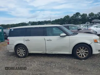 2011 Ford Flex SEL z VIN 2FMGK5CC4BBD17708, wystawiony jako IAAI lot #40367967 z przebiegiem 223 799 mil mil oraz . Historia ofert i sprzedaży dostępna na DreamBid. Obrazek 13.