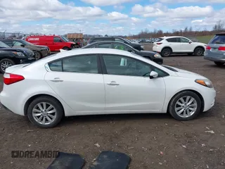2014 Kia Forte EX with VIN KNAFX4A8XE5050378, listed as a IAAI auction lot 41923798 with 104,712 mi miles. Bid and sale history available at carsss.com. Image 13.
