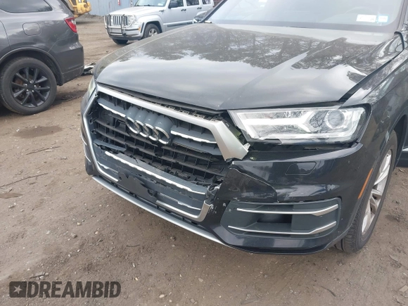 2019 Audi Q7 Premium with VIN WA1AAAF74KD002299, listed as a IAAI auction lot 42066717 with 91,898 mi miles and . Bid and sale history available at DreamBid. Image 6.