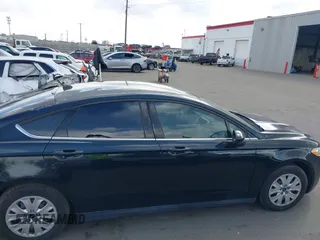 2014 Ford Fusion S with VIN 3FA6P0G76ER204761, listed as a IAAI auction lot 41948590 with 171,605 mi miles and . Bid and sale history available at DreamBid. Image 13.
