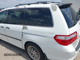 2007 Honda Odyssey LX with VIN 5FNRL382X7B135892, listed as a IAAI auction lot 42223231 with 204,054 mi miles and . Bid and sale history available at DreamBid. Image 19.