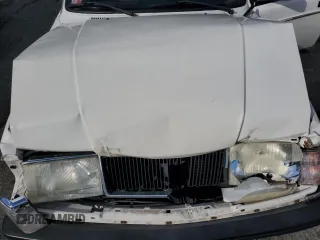 1993 Volvo 240 z VIN YV1AS8805P1479399, wystawiony jako Copart lot #72442804 z przebiegiem 163 003 mil mil oraz Szkody całkowita. Historia ofert i sprzedaży dostępna na DreamBid. Obrazek 11.