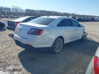 2013 Ford Taurus Limited with VIN 1FAHP2F84DG166824, listed as a IAAI auction lot 41887725 with 119,864 mi miles. Bid and sale history available at carsss.com. Image 4.