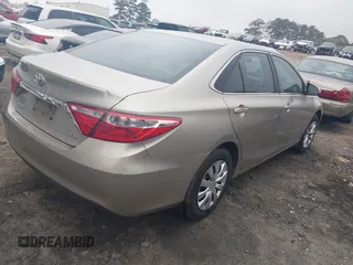 2015 Toyota Camry XLE with VIN 4T1BF1FK2FU992015, listed as a IAAI auction lot 41928373 with 95,570 mi miles and . Bid and sale history available at DreamBid. Image 4.