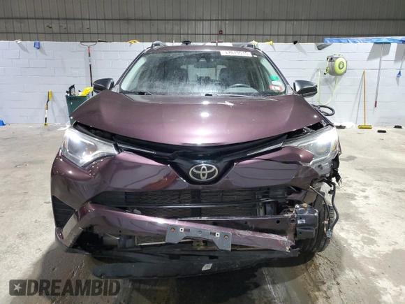 2017 Toyota RAV4 LE with VIN 2T3BFREV9HW650565, listed as a Copart auction lot 47019515 with 87,329 mi miles and Salvage Title. Bid and sale history available at DreamBid. Image 5.
