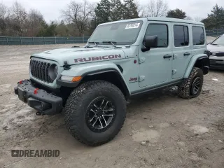 2024 Jeep Wrangler Rubicon X with VIN 1C4RJXFG6RW337803, listed as a Copart auction lot 83795214 with 1,585 mi miles and Salvage title. Bid and sale history available at DreamBid. Image 1.