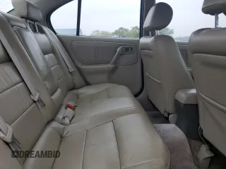 2000 Infiniti G20 Luxury z VIN JNKCP11A1YT304887, wystawiony jako Copart lot #74562724 z przebiegiem 202 140 mil mil oraz Czysty tytuł • Clean title. Historia ofert i sprzedaży dostępna na DreamBid. Obrazek 10.