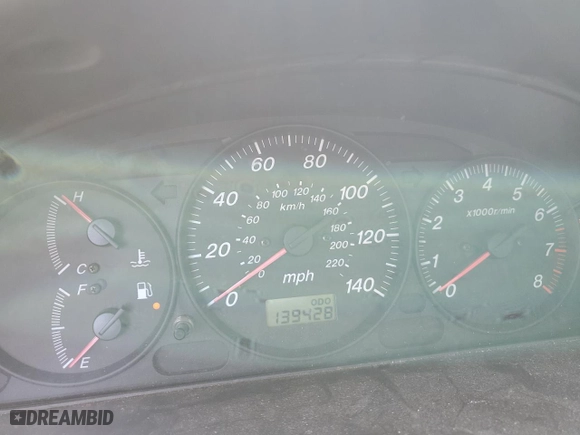 2000 Mazda Protege DX with VIN JM1BJ222XY0199683, listed as a Copart auction lot 50010565 with 139,428 mi miles and Salvage Title. Bid and sale history available at carsss.com. Image 9.