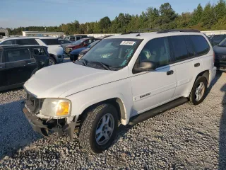 2004 GMC Envoy SLE with VIN 1GKDS13S542233286, listed as a Copart auction lot 76129164 with 228,981 mi miles and Salvage Title. Bid and sale history available at carsss.com. Image 1.