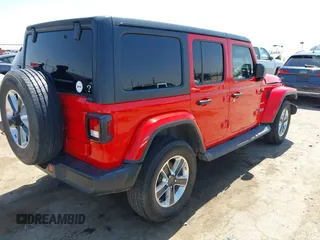 2019 Jeep Wrangler Unlimited Sahara with VIN 1C4HJXEN8KW591398, listed as a IAAI auction lot 42045071 with 87,410 mi miles and . Bid and sale history available at DreamBid. Image 4.