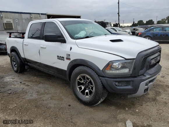 2018 Ram 1500 Rebel with VIN 1C6RR7YT7JS235965, listed as a Copart auction lot 84749674 with 61,484 mi miles and Salvage Title. Bid and sale history available at carsss.com. Image 4.