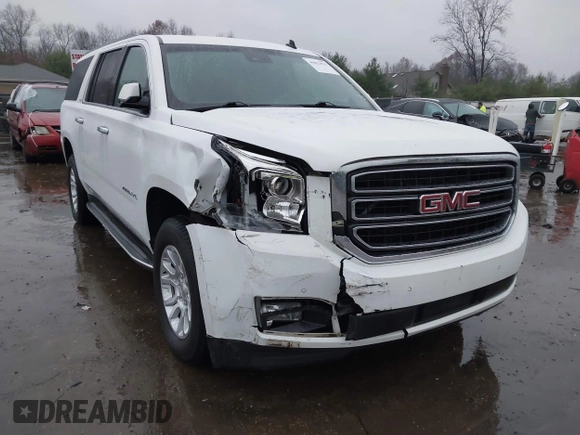 2015 GMC Yukon XL SLT with VIN 1GKS1HKC7FR223513, listed as a IAAI auction lot 40822575 with 128,239 mi miles. Bid and sale history available at carsss.com. Image 6.