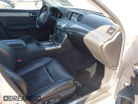 2006 Infiniti M z VIN JNKAY01E46M110394, wystawiony jako IAAI lot #42309941 z przebiegiem 140 240 mil mil oraz . Historia ofert i sprzedaży dostępna na DreamBid. Obrazek 5.