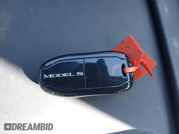 2016 Tesla Model S 90D with VIN 5YJSA1E22GF174301, listed as a IAAI auction lot 38867108 with 60,715 mi miles and . Bid and sale history available at DreamBid. Image 11.