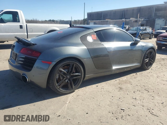 2014 Audi R8 z VIN WUAAUAFG0EN000936, wystawiony jako Copart lot #46513185 z przebiegiem Nie podano mil oraz Szkoda całkowita • Salvage title. Historia ofert i sprzedaży dostępna na DreamBid. Obrazek 3.