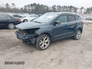 2019 Ford Escape Titanium with VIN 1FMCU9J93KUB84831, listed as a IAAI auction lot 41514146 with 105,072 mi miles. Bid and sale history available at carsss.com. Image 17.