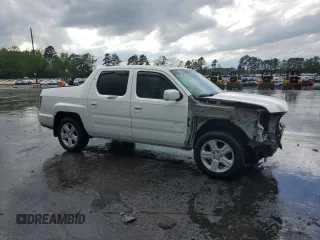 2010 Honda Ridgeline RTL z VIN 5FPYK1F53AB006195, wystawiony jako Copart lot #52528435 z przebiegiem 205 522 mil mil oraz Szkoda całkowita • Salvage title. Historia ofert i sprzedaży dostępna na DreamBid. Obrazek 4.