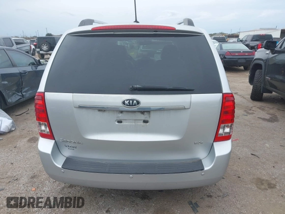 2012 Kia Sedona EX with VIN KNDMH4C74C6497243, listed as a IAAI auction lot 41368080 with 218,806 mi miles. Bid and sale history available at carsss.com. Image 16.
