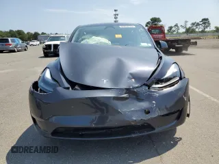 2024 Tesla Model Y Long Range с VIN 7SAYGDEE7RF180945, выставлен на аукционе Copart как лот 62059735 с пробегом Не указан миль и Списание • Salvage title. История ставок и продаж доступна на DreamBid. Изображение 5.