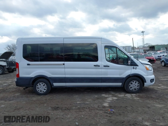 2021 Ford Transit Passenger XL with VIN 1FBAX2C82MKA32735, listed as a IAAI auction lot 41312892 with 62,053 mi miles and . Bid and sale history available at DreamBid. Image 14.