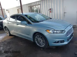 2014 Ford Fusion SE Hybrid with VIN 3FA6P0LU8ER283409, listed as a IAAI auction lot 40984629 with 206,605 mi miles. Bid and sale history available at carsss.com. Image 13.