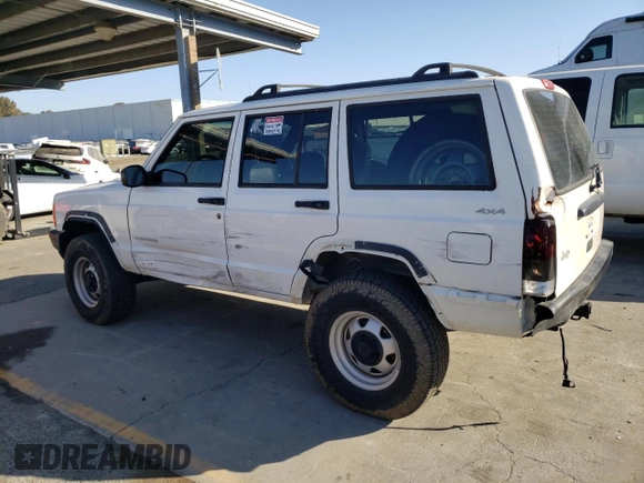 2000 Jeep Cherokee SE with VIN 1J4FF28S5YL243656, listed as a Copart auction lot 71364434 with 222,032 mi miles and Salvage Title. Bid and sale history available at carsss.com. Image 2.