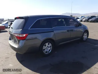 2012 Honda Odyssey LX with VIN 5FNRL5H24CB019934, listed as a Copart auction lot 52412605 with 157,725 mi miles and Salvage Title. Bid and sale history available at carsss.com. Image 3.