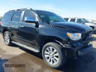 2014 Toyota Sequoia Limited with VIN 5TDKY5G13ES055656, listed as a IAAI auction lot 41616322 with 118,859 mi miles. Bid and sale history available at carsss.com. Image 1.