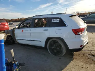 2013 Jeep Grand Cherokee Overland with VIN 1C4RJFCG5DC639401, listed as a Copart auction lot 79003094 with 0 mi miles and Salvage Title. Bid and sale history available at carsss.com. Image 2.