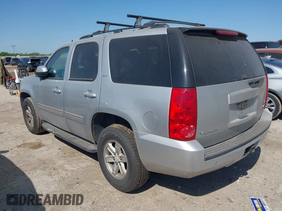 2013 GMC Yukon SLT with VIN 1GKS1CE09DR268602, listed as a IAAI auction lot 41992325 with 167,476 mi miles. Bid and sale history available at carsss.com. Image 3.
