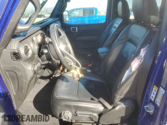 2018 Jeep Wrangler Unlimited Sahara z VIN 1C4HJXENXJW262779, wystawiony jako Copart lot #47882345 z przebiegiem Nie podano mil oraz Szkoda całkowita • Salvage title. Historia ofert i sprzedaży dostępna na DreamBid. Obrazek 7.