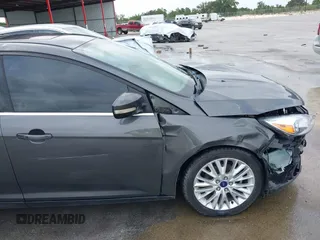 2017 Ford Focus Titanium with VIN 1FADP3N20HL210364, listed as a IAAI auction lot 42130643 with 132,312 mi miles and . Bid and sale history available at DreamBid. Image 21.
