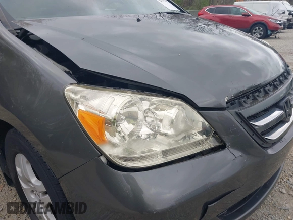2007 Honda Odyssey EX-L with VIN 5FNRL38767B406636, listed as a IAAI auction lot 42032947 with 228,139 mi miles and . Bid and sale history available at carsss.com. Image 19.