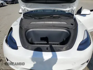 2024 Tesla Model Y Long Range с VIN 7SAYGDEE8RF983067, выставлен на аукционе Copart как лот 61217015 с пробегом 57 082 миль миль и Списание • Salvage title. История ставок и продаж доступна на DreamBid. Изображение 12.