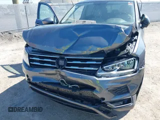 2018 Volkswagen Tiguan SEL z VIN 3VV3B7AXXJM205725, wystawiony jako IAAI lot #42285557 z przebiegiem 83 644 mil mil oraz . Historia ofert i sprzedaży dostępna na DreamBid. Obrazek 6.