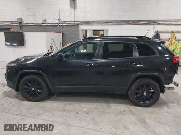 2014 Jeep Cherokee Latitude with VIN 1C4PJMCS6EW299532, listed as a IAAI auction lot 41833888 with 199,915 mi miles and . Bid and sale history available at DreamBid. Image 14.