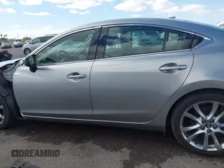 2014 Mazda 6 i Grand Touring with VIN JM1GJ1W57E1104801, listed as a IAAI auction lot 42060144 with 95,212 mi miles. Bid and sale history available at carsss.com. Image 15.