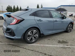 2021 Honda Civic Sport with VIN SHHFK7H4XMU422397, listed as a Copart auction lot 50767515 with 87,010 mi miles and Salvage Title. Bid and sale history available at DreamBid. Image 3.