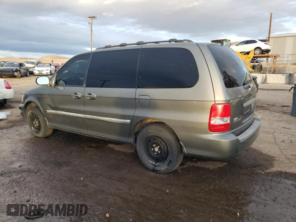 2003 Kia Sedona LX with VIN KNDUP131636359281, listed as a Copart auction lot 81978154 with 180,813 mi miles and Salvage Title. Bid and sale history available at carsss.com. Image 2.
