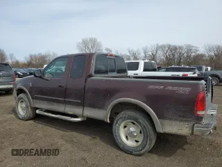 2001 Ford F-150 XL with VIN 1FTRX18L61NB40999, listed as a Copart auction lot 49641305 with 216,452 mi miles and Salvage Title. Bid and sale history available at carsss.com. Image 2.