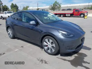 2021 Tesla Model Y Performance with VIN 5YJYGDEF7MF273897, listed as a IAAI auction lot 41925881 with 29,345 mi miles. Bid and sale history available at carsss.com. Image 1.